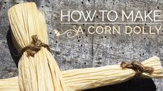 two corn husks tied up to each other with the words how to make acorn dolly