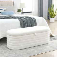 a bed with an inflatable mattress sitting on top of it