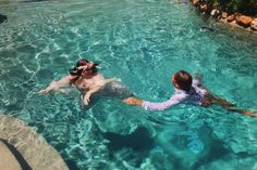 Capture the joy and spontaneity of a wedding at The Braun Manor with this adorable photo of a couple taking a swim in their wedding attire. This beautiful venue sets the stage for unforgettable moments and playful memories. Let this fun and unique celebration inspire your own dream wedding. Wedding Attire, Fun Wedding, Wedding Events, Dream Wedding, Swimming