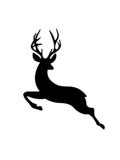 a black and white silhouette of a deer jumping in the air with antlers on its back