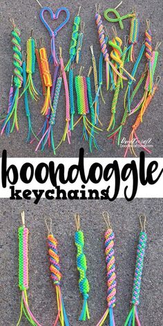 there are several different types of beads on the ground with words boooooggle keychains