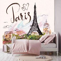 the eiffel tower in paris is painted on a wall above a bed with pink sheets