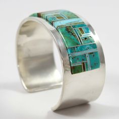 Sterling Silver Cuff Bracelet with Channel Inlaid Kingman Turquoise from Arizona.1” Cuff Width5.25” Inside Measurement, plus 1” opening(6.25" Total Circumference - Small-Medium) Sterling Silver Cuff Bracelet, Kingman Turquoise, Sterling Silver Cuff, Silver Cuff Bracelet, Silver Cuff, Cuff Bracelet, Cuff, Turquoise, Bracelet