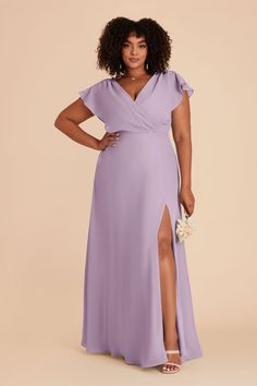 a woman in a long purple dress