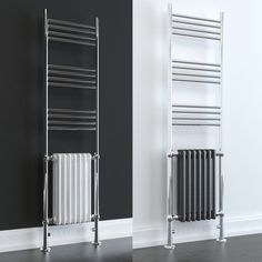 two different types of radiators in a room with black walls and white floors