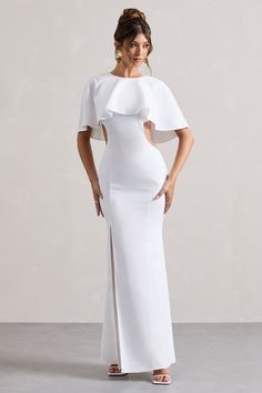 Isadora | Ivory Cut-Out Split Maxi Dress With Cape Elegant Long Dress With Cutout, Elegant Evening Maxi Dress With Cutout, Elegant White Cutout Dress, Elegant Maxi Dress With Cutout Details, White Cutout Dress For Formal Occasions, White Cutout Formal Dress, Elegant White Floor-length Maxi Dress, White Evening Maxi Dress With Cutout, White Cutout Maxi Dress For Evening