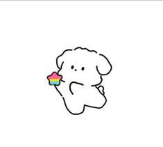 an elephant holding a rainbow cupcake in its trunk and looking at it's face