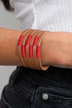 A brown leather band has been spliced into layered rows that wrap around the wrist. Red threaded accents wrap around the leather strips, creating a colorfully rustic display. Features an adjustable snap closure.

 Sold as one individual bracelet. Country Colors, Big Bracelets, Brown Leather Bracelet, Snap Bracelets, Red Bracelets, Paparazzi Accessories, Inspired Jewelry, Leather Wrap Bracelet, Paparazzi Jewelry