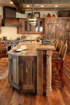 a large kitchen with wooden cabinets and an island