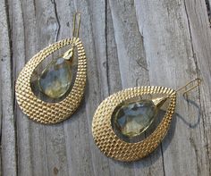 "A bohemian chic inspired handcrafted masterpiece in solid 18k Gold Large Hoop Earrings accented with Lemon Quartz. The earrings are hand carved giving way to a beautiful intricate texture, further accented with Lemon Quartz makes a timeless classic jewel. (e-124) Lemon Quartz(6.85cts) 11.5mm x 16.5mm Gold weight 15grams Drop length 2.5\" *Follow us @belesasjewelry on Instagram for promotions/giveaways *LIKE* us on Facebook http://www.facebook.com/Belesas *If you like the ring, please click on t Porter Ranch, Earring Handmade, Large Hoop Earrings, Lemon Quartz, Quartz Earrings, Gold Hoop, Tear Drop, Bohemian Chic, Unique Earrings