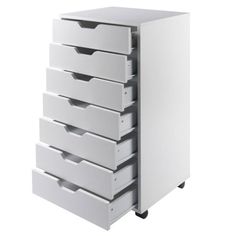 a white drawer with five drawers on wheels and four drawers in the bottom, one is empty