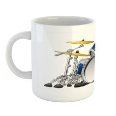 a white coffee mug with a drum set on it