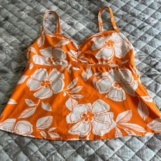 New Without Tags. Orange And White Flowered Tankini By Land’s End. Size Medium! Fitted Orange Beach Top, Fitted Orange Tops For Beach Season, Lightweight Spring Beach Top, Lined Tops For Beach In Spring, Summer Vacation Lined Top, Lined Summer Top For Vacation, Spring Beach Lined Tops, Lined Summer Vacation Top, Lined Tops For Beach Spring Season