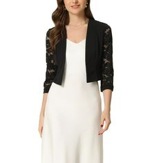 Elegant and versatile: Our cardigan dress features a lace panel and open front design, adding a touch of sophistication to your wardrobe. Functional and stylish: This long-sleeve bolero shrug can be worn as a dress or layered over other outfits, making it a versatile piece for work and casual occasions. Comfortable and breathable: Made from soft materials, this cardigan dress offers all-day comfort and breathability without compromising on style. Flattering silhouette: The crop length and lace p Fitted Party Shrug With Lace Trim, Party Shrug With Lace Trim, Long Sleeve Lace Shrug With Lace Trim, Elegant 3/4 Sleeve Shrug For Spring, Chic Fitted 3/4 Sleeve Shrug, Chiffon Cardigan, Pullover Cardigan, Lace Panelled, Other Outfits