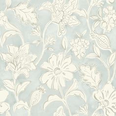 a blue and white wallpaper with flowers on it