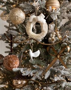 a decorated christmas tree with ornaments on it