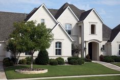 a large white house with lots of windows