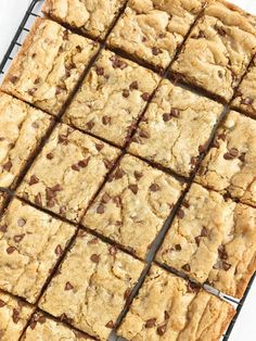 chocolate chip cookie bars on a cooling rack ready to be cut into squares for dessert