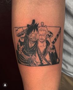 an inked photo of three anime characters on the thigh, one is holding a guitar