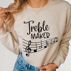 Treble Maker Sweatshirt, Funny Musician Hoodie, Music Lovers Gift, Piano Player Gift, Piano Lover Shirt, Gift For Musicians, Music Notes Tee Welcome to NIOBE BOUTIQUE. I am happy to see you in my shop. My main purpose is to meet you with a high-quality product. I use the best product to make you happy. Your satisfaction is my priority.  Placing an order is simple!  *Please review all images in this listing for style, color, and sizes.  *Select your t-shirt color and size from the drop-down menus Music-themed Long Sleeve Sweatshirt For Fall, Music-themed Cotton Sweatshirt With Letter Print, Music-themed Letter Print Cotton Sweatshirt, Music-themed Cotton Graphic Sweatshirt, Music-themed Cotton Crew Neck Sweatshirt, Music-themed Cotton Letter Print Sweatshirt, Music Puns, Musician Humor, Pun Shirts