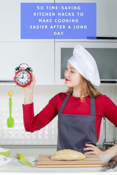 a woman holding an alarm clock in her hand and wearing a chef's hat