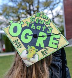 a graduate's cap with the words, i am glad that's ore and gre on it