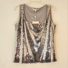 New With Tags Silver Sequins Lined Sleeveless Stretchy Pit To Pit 18.5" Waist 17.5" Length 24" Spring Sequin Sleeveless Vest, Spring Sleeveless Sequin Vest, Fitted Sequin Tank Top, Fitted Sequin Sleeveless Tank Top, Burgundy Shirt, Spring Blouses, Pleated Blouse, Yellow Blouse, Black And White Tops