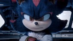 sonic the hedgehog from sonic the hedgehog is looking at something with big eyes