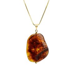 Due to inherent nature of natural stones, there may be slight variation in stone sizes, shapes, colors and patterns Cognac Baltic Amber Vermeil NecklaceAmber Stone Approx. 1 1/4" long x 1" wideItalian 18kt Vermeil Box Link Chain. Adjustable Length Approx. 16" - 18"Due to inherent nature of natural stones, there may be slight variation in stone sizes, shapes, colors and patternsStones: AmberLength: Adjustable Length Approx. 16" - 18"Width: Amber Stone Approx. 1 1/4" long x 1" wideMaterial: Vermei Luxury Amber Gemstone Necklace, Luxury Amber Necklace With Large Pendant, Necklace Stones, Amber Stone, Stone Pattern, Stone Pendant Necklace, Baltic Amber, Gold Plated Silver, Link Chain