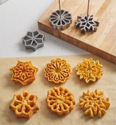 the cookies are shaped like snowflakes and ready to be cut into smaller pieces