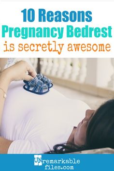 a pregnant woman laying in bed with her shoes on top of her belly and the words, 10 reasons pregnancy bed rest is secretly awesome