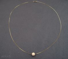 "New and exclusive to Benati. A very elegant round bead necklace, floating gracefully on a dainty solid 14k gold chain. Crafted to perfection in 14k solid gold. The pendant is hanged on a elegant, delicate and dainty gold 'box' approx. 0.6mm chain. if you wish for a thicker chain approx. 0.8mm chain, you can choose so at the checkout process. The pictures are of the approx. 0.6mm gold chain. You or your friend will look super fine with this new exclusive design - by Benati. The size of the round Elegant Gold Rondelle Beaded Necklaces, Gold Single Strand Necklace With Rondelle Beads, Elegant Gold Chain Jewelry With Round Beads, Yellow Gold Necklaces With Round Beads, Gold Rondelle Necklaces With Gold Beads, Gold Rondelle Necklaces For Formal Occasions, Gold Rondelle Necklace For Formal Occasions, Gold Pendant Necklace With Polished Beads, Gold Sphere Ball Chain Jewelry