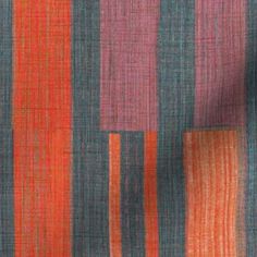 an orange and blue striped fabric