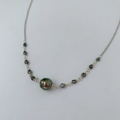 "Looking for something unique and different? This beautiful necklace displays a nice and small Tahitian Pearl paired with small and dainty tahitian keshis pearls . ✨This Listing is for Sterling Silver. For the Gold-filled necklace is click on the following link: Length : 17-18\" if you need a different size please specify at checkout . There is an extender on the back to make it more versatile and can be adjusted slightly about 1\" . Description ✨Tahitian pearls: Size : 8-9mm small and dainty si Silver Single Strand Pearl Pendant Necklace, Single Strand Mother Of Pearl Necklace For Gift, Single Strand Mother Of Pearl Necklace Gift, Mother Of Pearl Single Strand Necklace Gift, Gift Tahitian Pearl Necklace With High Luster, Tahitian Pearl Drop Necklace As Gift, Tahitian Pearl Drop Necklace For Gift, Handmade Pearl Necklace With Briolette Shape, High Luster Tahitian Pearl Necklace As Gift