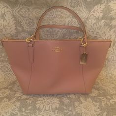 Beautiful Rose Color; Outside Slip Pocket; Interior Zip Pocket And Two Slip Pockets; Matte Gold Hardware. New, Never Used. Smoke-Free Home. Coach Blush Bag For Everyday Use, Blush Coach Bag For Everyday Use, Blush Tote Bag For Shopping, Elegant Pink Bags For On-the-go, Everyday Blush Shoulder Bag With Handles, Blush Leather Tote Bag, Blush Crossbody Bag With Handles, Blush Double Handle Bag For Everyday Use, Blush Tote Shoulder Bag For Errands