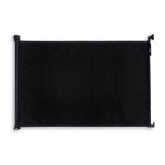 a black wall hanging on the side of a white wall with an iron bar attached to it