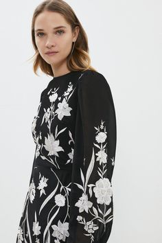 Style: Shirt DressFabric: Hand StitchLength: MidiNeckline: CrewSleeve Length: Long Sleeve Elegant Fitted Dresses With Embroidered Sleeves, Chic Midi-length Embroidered Dress With Floral Print, Chic Embroidered Dress With Floral Design For Evening, Chic Floral Embroidered Evening Dress, Chic Floral Embroidered Dress For Wedding, Chic Embroidered Dress For Formal Occasions, Chic Embroidered Formal Dresses, Chic Floral Embroidered Wedding Dress, Party Dresses With Embroidered Sleeves And Maxi Length