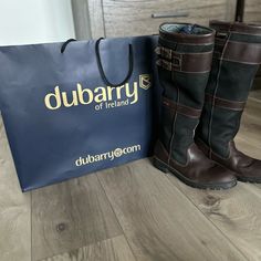 Product Details Dubarry Longford Leather Country Boot Combines Great Performance Outdoors With Distinctive Design And An Elegant Silhouette. Team With A Dubarry Tweed Jacket For A Classic Country Style Or For A More Urban Feel Match With Denim Jeans And A Dubarry Oranmore Vest Or Joyce Leather Jacket. Gore-Tex Lining Ensures Longford Boots Are Waterproof But Breathable And A Purpose Designed Sole Gives Shock Absorbing Comfort. Boots Are Pulled On, Helped By Discreet Finger Pulls And An Elasticat Leather Country Boots, Dubarry Boots, Country Boots, Tweed Jacket, Gore Tex, Country Style, Soft Leather, Leather Boots, Knee High