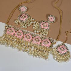 Gorgeous handmade gold-plated jewelry set (necklace, earrings, and tikka) with gold, silver and light pink detailing and tumble bead work. Fully adjustable necklace Earring length: 4 inch Earring width: 2 inch Tikka Maang length: 7.25 inch Tikka Maang width: 2 inch **Looking to bundle/add-on? Message me for an additional 5% off your cart! Always gift wrapped & dispatched with free, tracked shipping 🧡 All photos are taken in natural lighting without editing, but our jewelry is really shiny so it Punjabi Earrings, Cotton Pouch, Indian Jewelry Sets, Polki Jewellery, Bollywood Jewelry, South Indian Jewellery, India Jewelry, Natural Lighting, Set Necklace