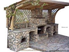 an outdoor stone oven with trees growing on it's sides and the words internet above it