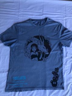 a t - shirt with an image of a woman and flowers on it