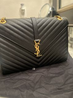 YSL Saint Laurent ENVELOPE LARGE BAG Black Pre-owned. Authentic YSL Saint Laurent ENVELOPE LARGE BAG Pre-owned Includes DUST BAG AND CARD Ysl Document Holder, Ysl Envelope Medium Bag, Vintage Ysl Purse, Ysl Envelope Bag, Ysl Envelope, Ysl Saint Laurent, Envelope Bag, Large Bag, Bags Handbags