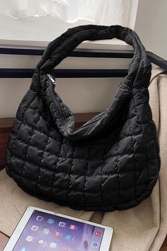 Elevate your look with the elegant quilted design of this shoulder bag. Think FP dupe Its spacious size, accommodates all your essentials with ease. The zipper closure ensures the secure storage of your belongings. Dimensions (inch): one : 15.75” (Length), 4.75 (Width), 12”(Height) * color may vary slightly due to image and screen lighting* **FREE SHIPPING** *ships approx. 3-4 bus days after purchase from CA Quilted Shoulder Bag, Quilted Handbags, Classic Bags, Large Shoulder Bags, Black Quilt, Quilted Bag, Zipper Top, Travel Companion, Weekender Bag