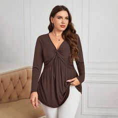 Introducing our Plus Size Waist-Controlled Knitted Bottoming Shirt, an elegant and versatile addition to your office wardrobe. This V-neck top is designed to provide a flattering fit for the modern plus-size woman while offering a chic and sophisticated style suitable for the office environment.Crafted with meticulous attention to detail, the waist-controlled design adds a touch of elegance, creating a flattering silhouette. The knitted fabric adds texture and warmth, making this top perfect for cooler seasons. The V-neck design brings a classic and feminine vibe, making it suitable for various occasions.Ideal for office wear, this plus-size bottoming shirt seamlessly combines comfort and fashion. Whether you're attending meetings, presentations, or simply navigating a busy workday, this t Clothes Curvy, Office Wardrobe, Outdoor Clothes, Casual Long Sleeve Shirts, Plus Size Top, Spring Shirts, Elegant Shirt, Plus Size Womens Clothing, Summer Fashion Outfits