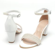 Discover the elegance of mid high heels in white. From stacked heel to mid block styles, find your perfect pair for weddings or everyday chic. Indulge in timeless elegance with these exquisite white mid-heeled bridal shoes, adorned with delicate pearls for a touch of sophistication. Crafted in Athens, Greece, these shoes feature genuine leather uppers and insoles, ensuring both luxury and comfort for your special day. The soft leather tie-up strap offers a secure fit, while the double-padded ins Heels For Wedding, Block Heels Wedding, Pearl Wedding Shoes, White Leather Sandals, Leather Sandals Handmade, Bridal Heels, Bridesmaid Shoes, Wedding White, Everyday Chic