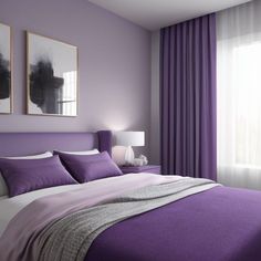 a bedroom with purple walls and white bedding, two framed pictures on the wall