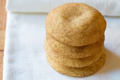 a stack of cookies sitting on top of a white napkin