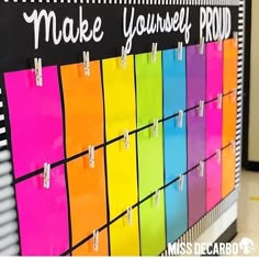 a colorful bulletin board with sticky notes on it