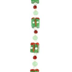 a green and red beaded necklace with bows on it's end, hanging from a string