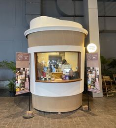 a display case in the corner of a building